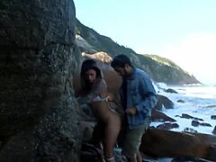 Mature woman enjoys public sex on a beach