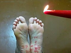 A mature couple's homemade foot fetish with tickling and wax play