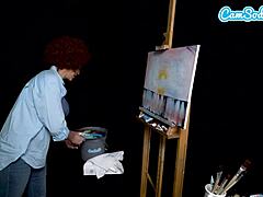 Cosplay di Ryan Keelys mentre Bob Ross la eccita durante un tutorial di pittura sulla webcam